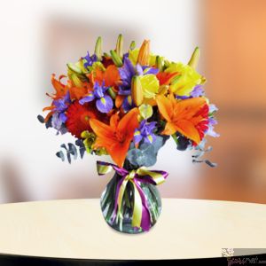 Arreglo Primaveral en Florero de Vidrio